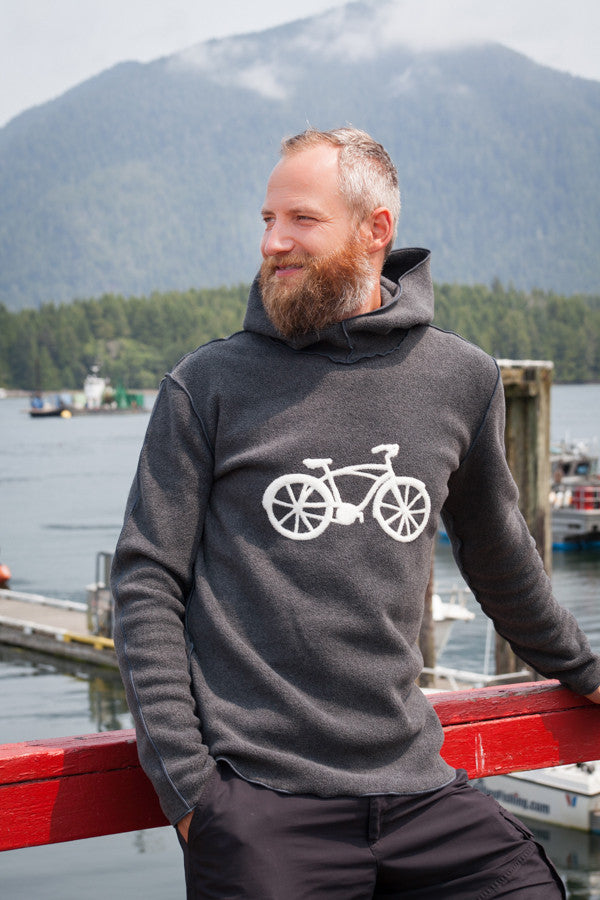 Mens charcoal grey hooded pullover with cream bike.